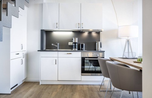 Wismar Apartment | Luxury apartment with gallery bedroom, roof terrace and unique harbor view!
