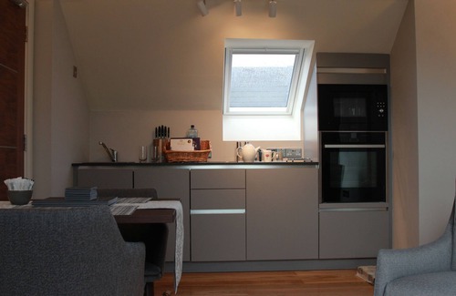 Inch Apartment | luxury apartment with private balcony and view to the sea