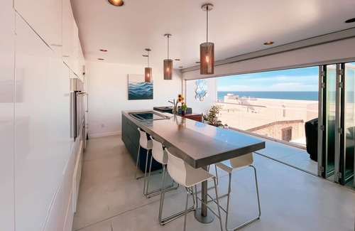 The Strand House | Luxury Beach Townhouse with Panoramic Ocean Views