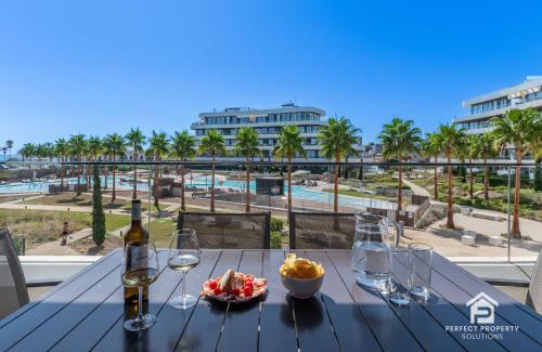 Torremolinos Apartment | Luxury beachfront 3BR in Nereidas with Pools Spa Gym