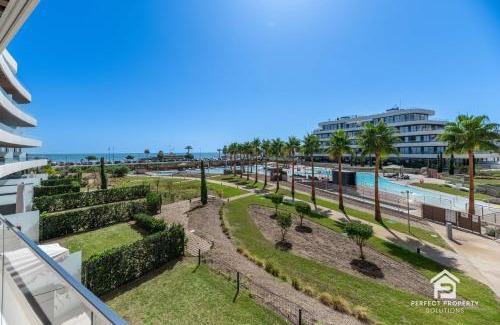 Torremolinos Apartment | Luxury beachfront 3BR in Nereidas with Pools Spa Gym