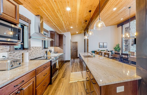 Harrison House | Luxury brand-new lake home with a dock, large deck, fireplace, & Ping-Pong