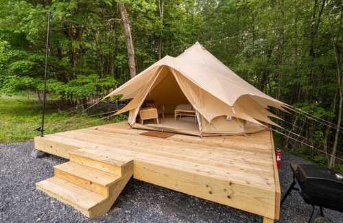 Great Cacapon RV Rental | Luxury Camping with King Bed - Clover Tent