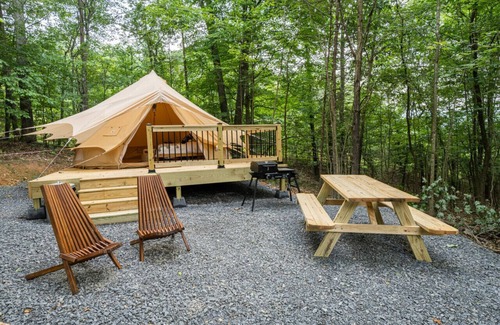 Great Cacapon RV Rental | Luxury Camping with King Bed - Dogwood Tent