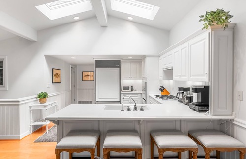 Green Lake House | Luxury carriage house with tons of space and 325 feet of shoreline!