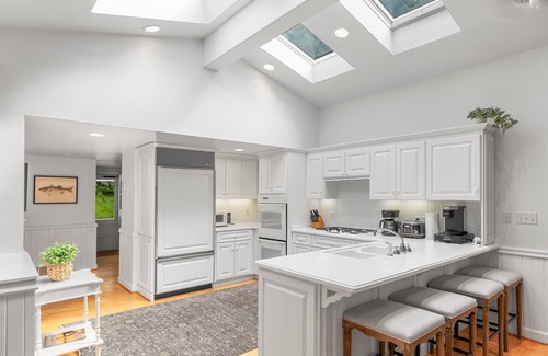 Green Lake House | Luxury carriage house with tons of space and 325 feet of shoreline!