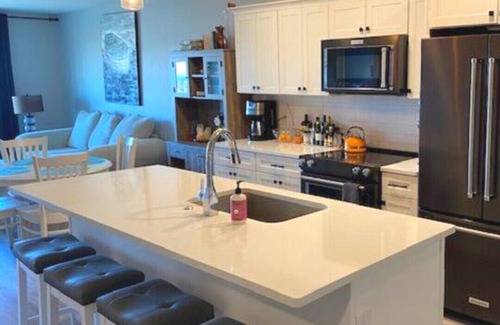 Saint Joseph Condo | Luxury Condo on River/Golf Course with all the amenities. 10 min walk to beach