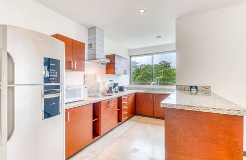 Zazil-ha Apartment | Luxury condo with modern kitchenette, fast WiFi, AC & pool - near the beach