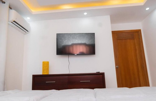 Santiago de los Caballeros Apartment | Luxury stay with terrace and private jacuzzi.