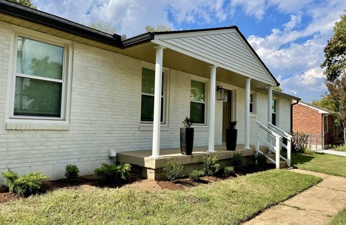 Porter Heights House | Luxury East Nashville home with high end furniture, large yard, and hot tub!
