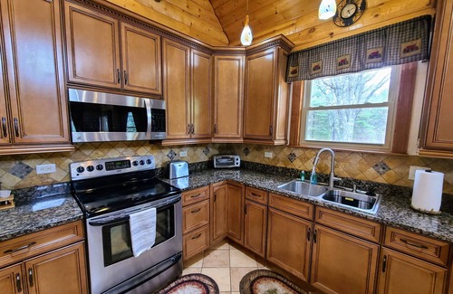 Necedah House | Luxury Family Cabin in a forest with a private pond