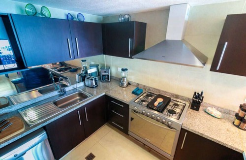 Fluvial Vallarta Condo | Luxury Grand Venetian Ocean Front 5 Pools, 10th floor Sleeps 4, Stunning Sunsets
