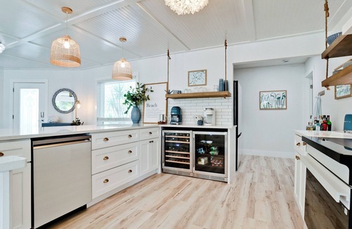 Holmes Beach House | Luxury ground, pet friendly - king suites, heated pool & hot tub - canal!