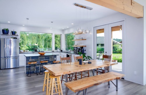 Libby House | Luxury Home on the Kootenai River with Panoramic Cabinet Mountain Views