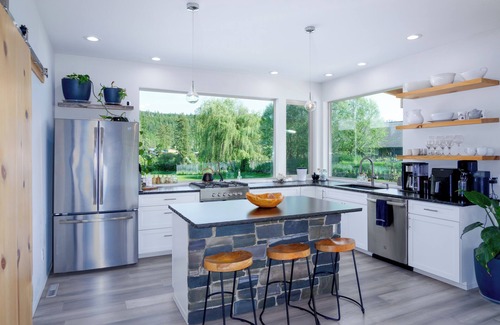 Libby House | Luxury Home on the Kootenai River with Panoramic Cabinet Mountain Views