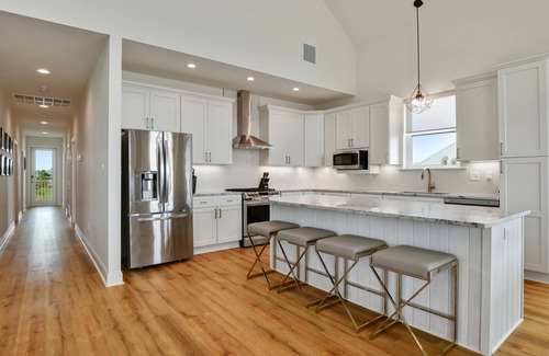 Waveland House | Luxury home with HEATED pool and spa on the Beach!