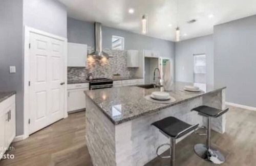 Near East Side House | Luxury Home with King Suite and Hot-Tub