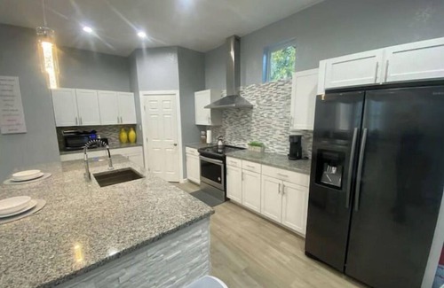 Near East Side House | Luxury Home with King Suite and Hot-Tub