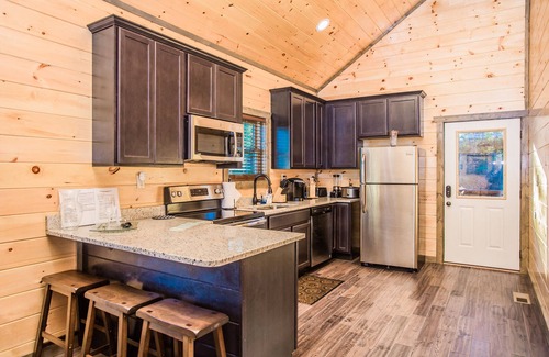 Hemlock Hills Cabin | LUXURY INDOOR HEATED Private Pool Cabin minutes from downtown Gatlinburg!