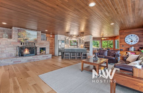 Hayden Lake House | Luxury Lakefront Property—Private Dock, Boat Slip, Fire Table, Hot Tub, Paddle Boards & More!