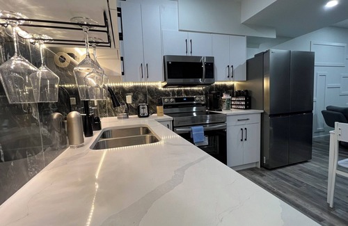 Southwest Calgary House | Luxury Living in a Private basement Suite