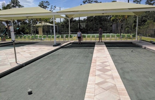 Estero Condo | Luxury Living in Pelican Sound Golf and River Club - Second Story Coach Home