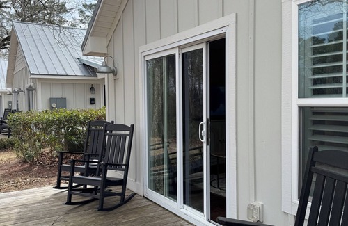 Elizabethtown Resort | Luxury Lodging, Lakefront View, King Bed w/Private Bath, Private Patio.