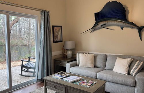 Elizabethtown Resort | Luxury Lodging, Lakefront View, Queen Bed w/Private Bath, Private Patio.