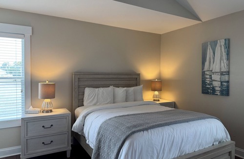 Elizabethtown Resort | Luxury Lodging, Lakefront View, Queen Bed w/Private Bath, Private Patio.