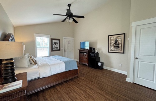 Elizabethtown Resort | Luxury Lodging, Lakefront View, King Bed w/Private Bath, Private Patio.
