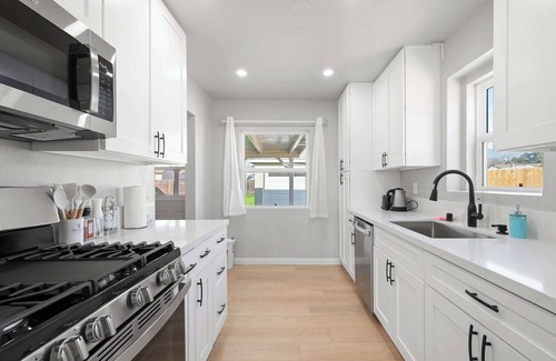 Monrovia House | Luxury Modern Retreat with Spacious Yard & Premium Comfort