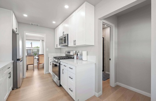 Monrovia House | Luxury Modern Retreat with Spacious Yard & Premium Comfort