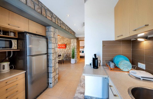 Pefkos Villa | Luxury Newly Built Stone Villa with Private Pool-Jacuzzi, Ideal for Relaxation.