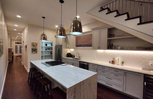 Central Carrollton Association House | Luxury renovation of historic shotgun home