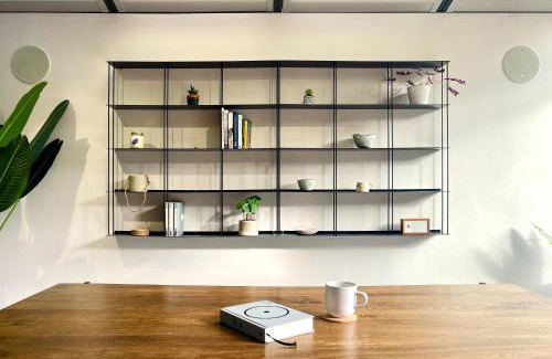 London Borough of Hounslow Apartment | Luxury Urban Oasis with Garden and Private Studio