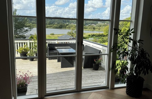 Vejle House | Luxury villa with forest in backyard and lakeview