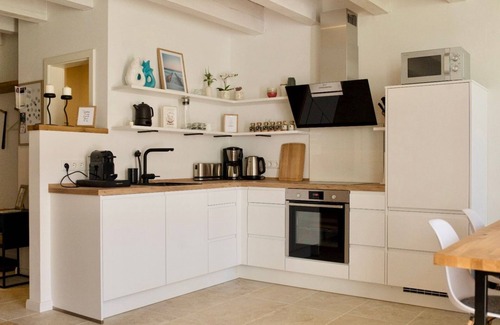 Rysum Apartment | "Maartje" Cozy & modern with sun terrace in Rysum - Van Senden