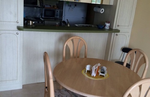Williams Town Condo | Magnificent beach front condo with pool and restaurant/bar