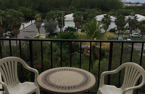 Williams Town Condo | Magnificent beach front condo with pool and restaurant/bar