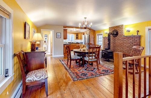 Perkinsville House | Magnificent mountain cottage with deck, firepit, W/D, wood stove, & water views