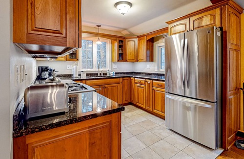 Perkinsville House | Magnificent mountain cottage with deck, firepit, W/D, wood stove, & water views