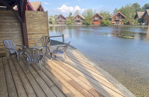 Hourtin Port Ski Chalet | Magnificent waterfront wooden chalet 100m from Lac d'Hourtin, 15 km from the ocean.
