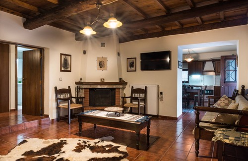 Psathoyiannos Cottage | Maro's village hall. Private & Serene Stone Villa
