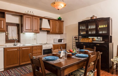 Psathoyiannos Cottage | Maro's village hall. Private & Serene Stone Villa