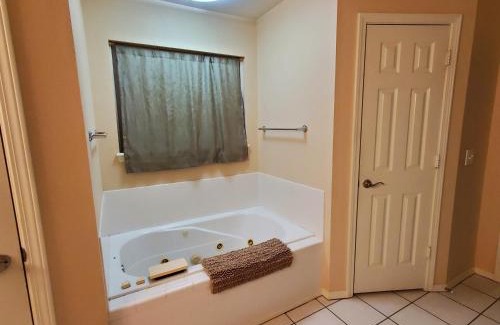 Bentonville House | Master Bed & Bath Just For You