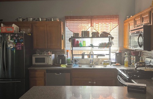 Greenacres Apartment | Master bedroom with private restroom and private entrance. Two full beds+ futon