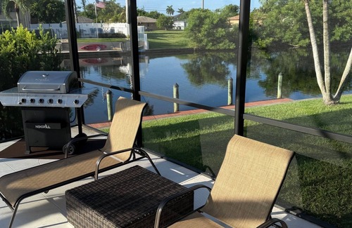 Pelican House | McShandy's 4B2B modern home with heated pool and gulf access