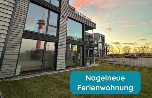 Marienleuchte Apartment | Meerglück am Beltblick Fehmarn - Moderne Ferienwohnung direkt an der Ostsee mit Sauna