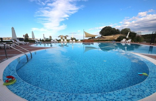 Dyuni Apartment | MENADA * SOUTH PEARL * Family studio with pool and sea view