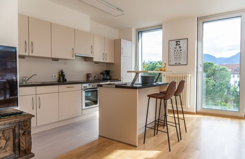 Merano Apartment | Merano center penthouse with terrace, garage, bike room and infrared sauna.